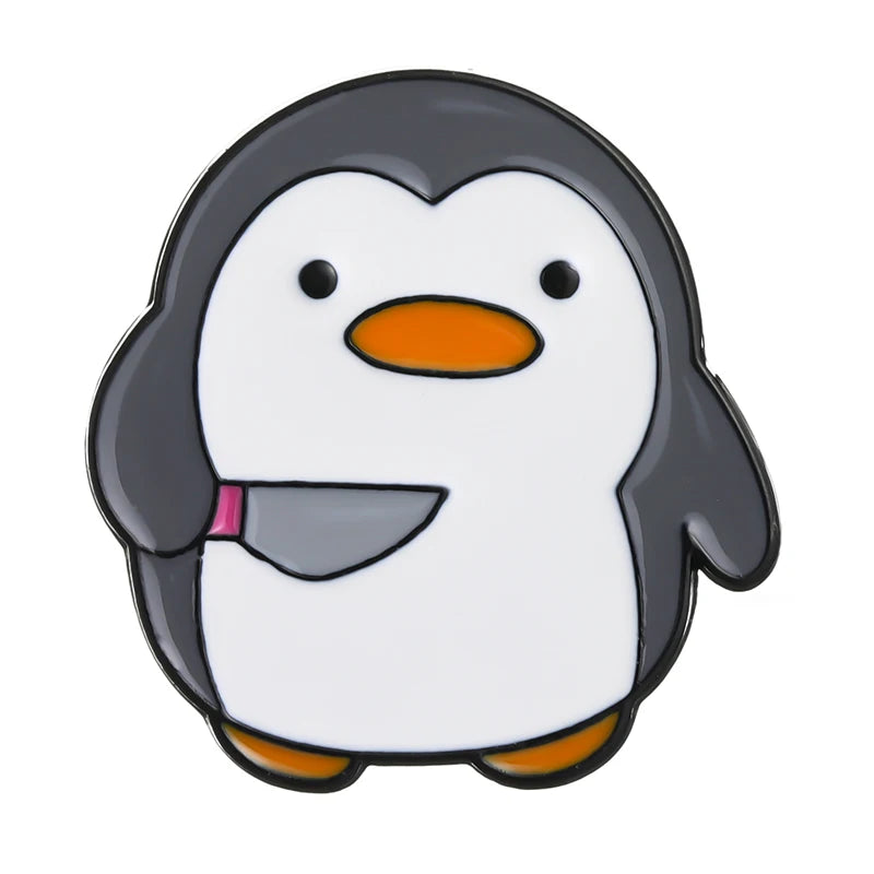 Pins de patos y pingüinos