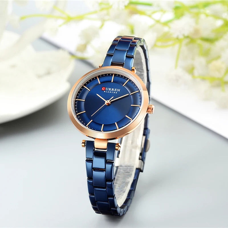 Reloj metálico de mujer