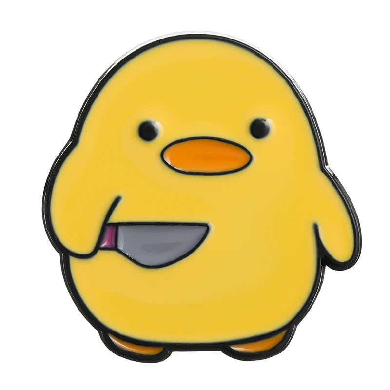 Pins de patos y pingüinos