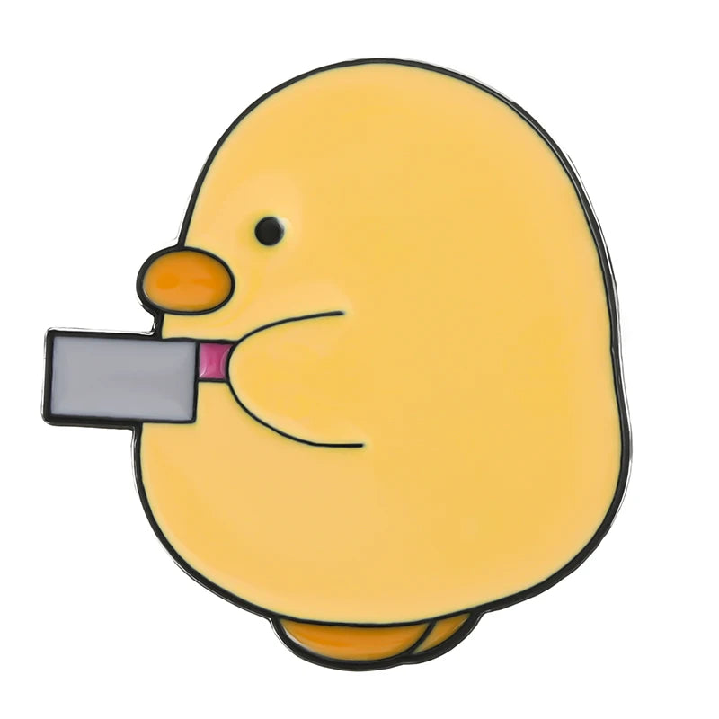 Pins de patos y pingüinos