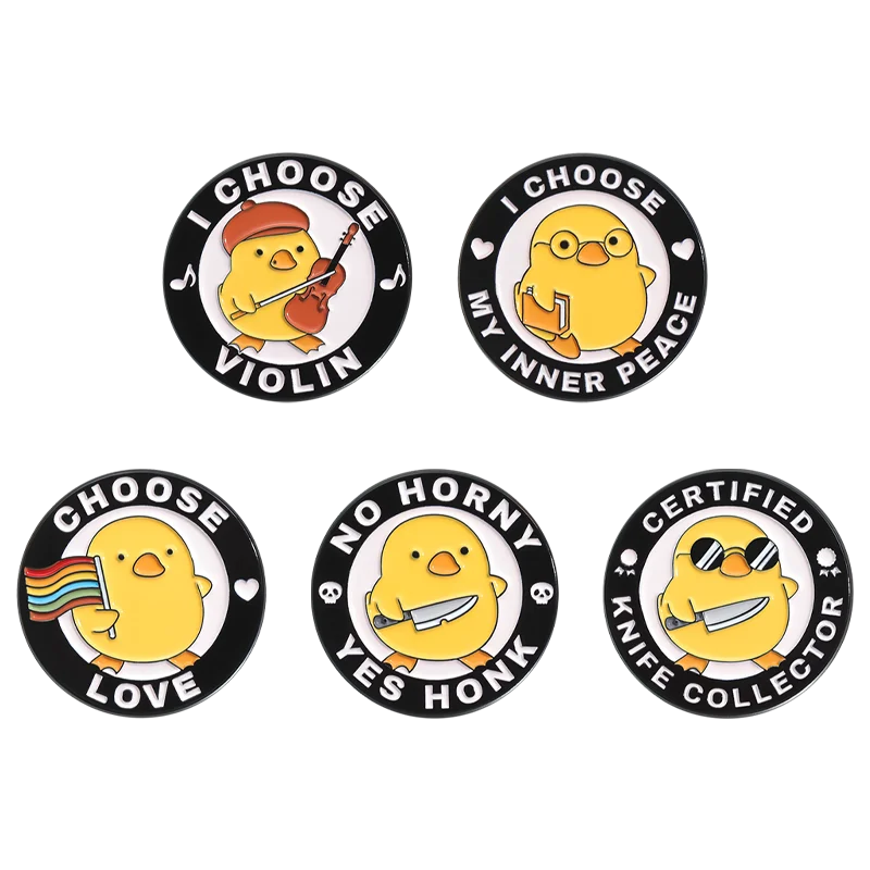 Pins de patos y pingüinos